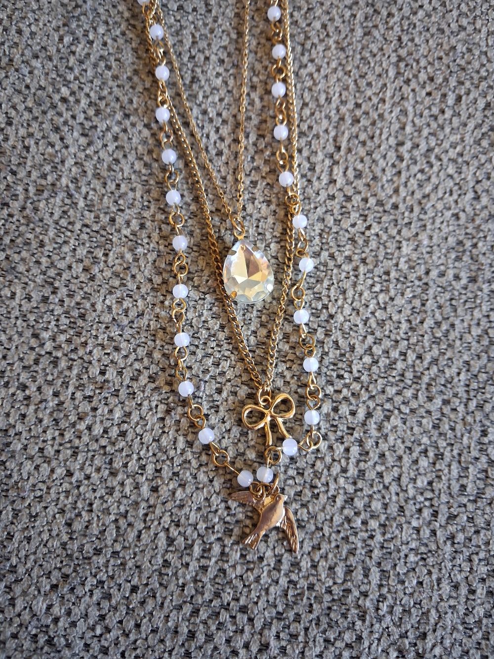 Gold-Tone Layered Pendant Necklace with White Beads and Crystal Accent